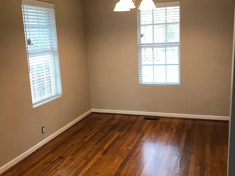 Dining room w view to back yard and kitchen