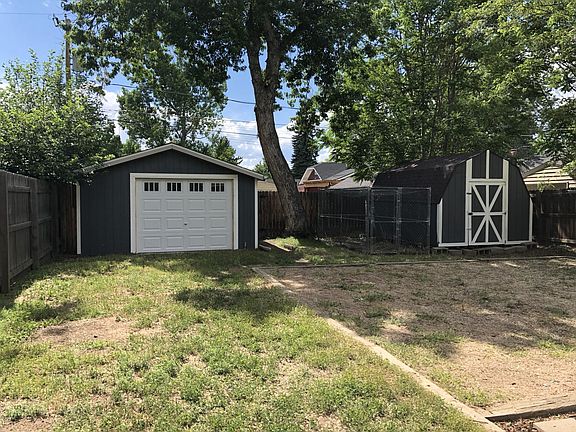Backyard with Garage and Shed