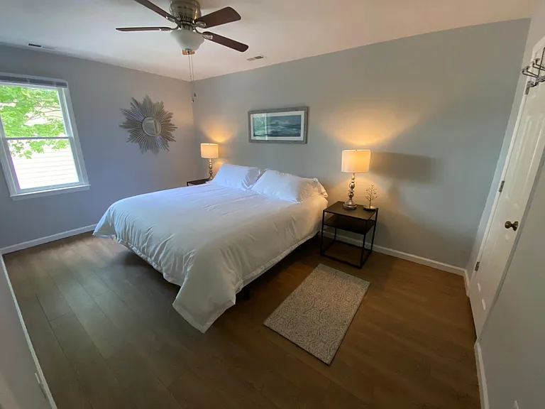 One of the 3 bedrooms upstairs with a king bed