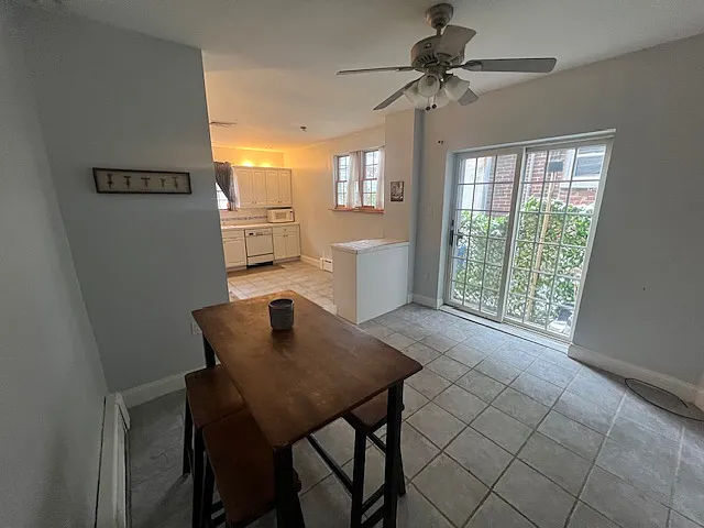 First half of kitchen, sliding doors to backyard