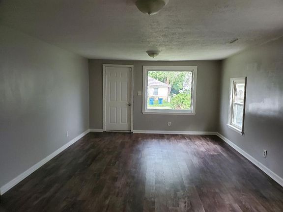 Abundant living room with brand new vinyl plank flooring