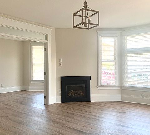 East facing windows with cozy gas fireplace.