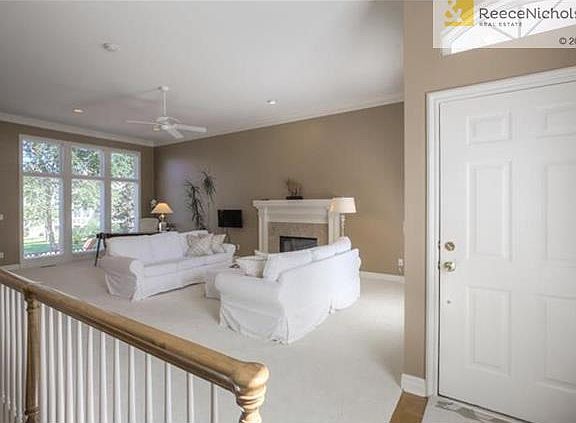 Spacious living & dining area.  Wall of windows floods the room with light.  New Karastan 60oz nylon carpet w/25 yr warranty throughout the home.  New interior high quality paint throughout.