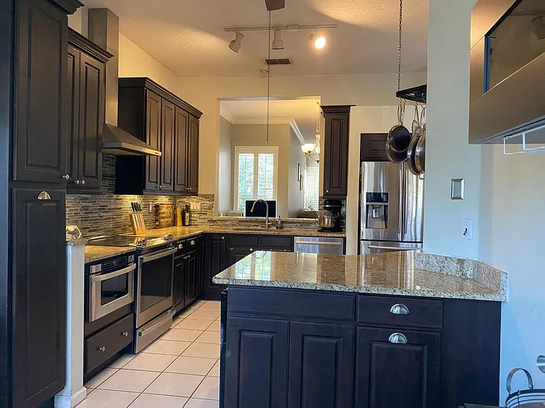 Chef's kitchen with pullout pantry and microwave drawer