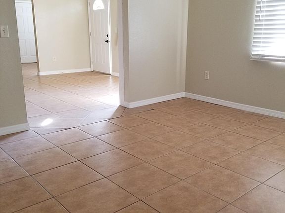 Standing in "bonus" room looking into dining/living room/front door.