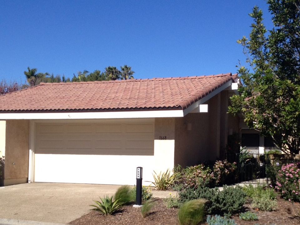 Front of house (Very large 2 Car garage with extra built in storage and washer & dryer)