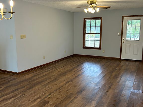 Entrance; living room and dining space