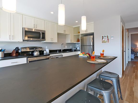 Kitchen and Hallway to Bathroom and Bedrooms