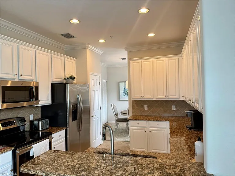 9498 Napoli Ln #201 — Photo 14