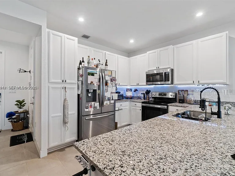 10934 SW 235th St — Photo 5