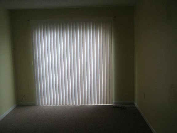 master bedroom w/private patio, his and her closets