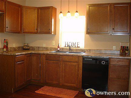 Brand new kitchen, granite-look counters, pendant lights