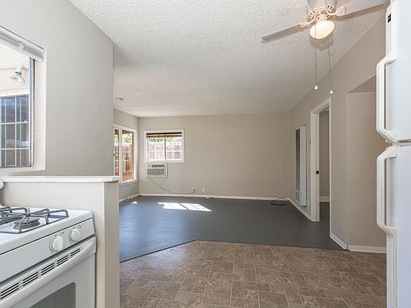 View from the kitchen and dining area into the Living space.
