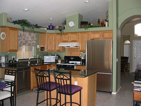 Upgraded kitchen with stainless steel appliances.