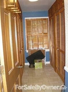 Spacious walk-in pantry with plenty of storage floor to ceiling.