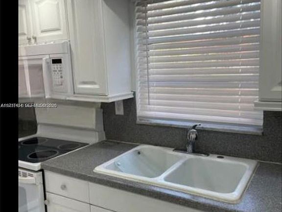3rd image of 1020 94th St APT 203