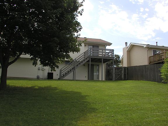 Deck, patio, and privacy fence - plenty of green space!