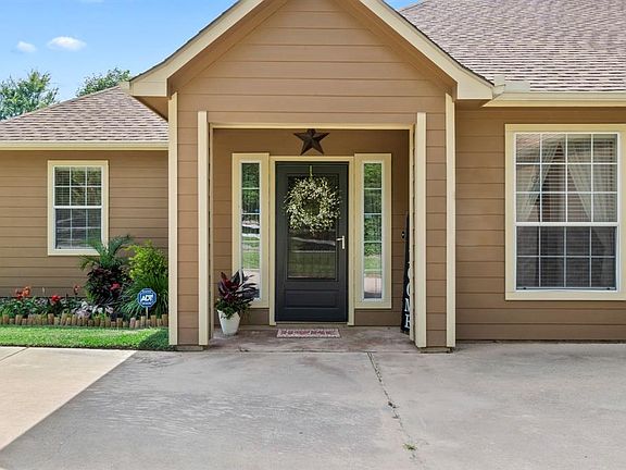 What a welcoming view of the home. The home is only 10 years old and rivals new construction.