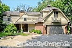 Front of house
						:
						Double entry doors w/ stained glass windows and glass and screen storm doors.