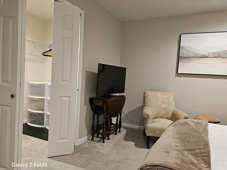 A walk in closet so big it could be another room! Another television here for late night TV viewing.