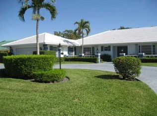 521 S Country Club Dr, Atlantis, FL 33462