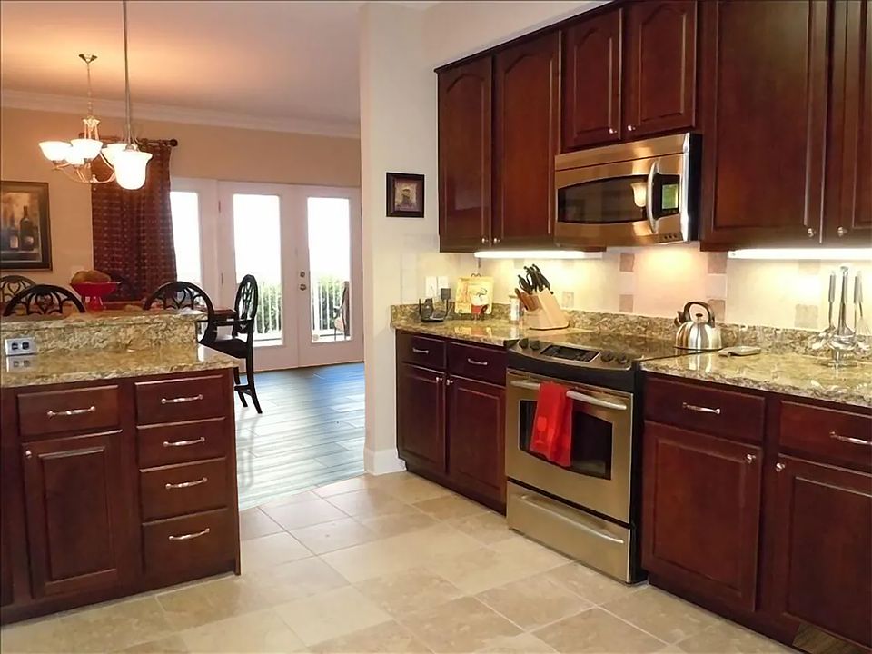 Kitchen, breakfast room, and porch