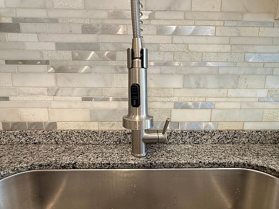 Deep sink and brand new faucet