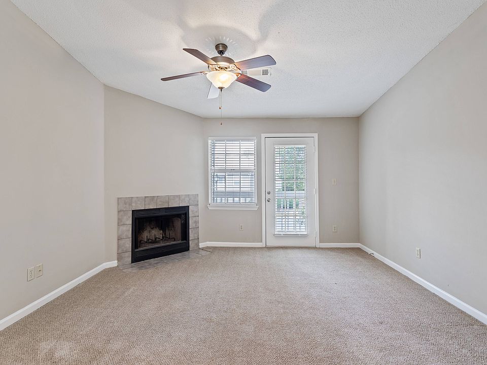 Living Room with Private Patio Access