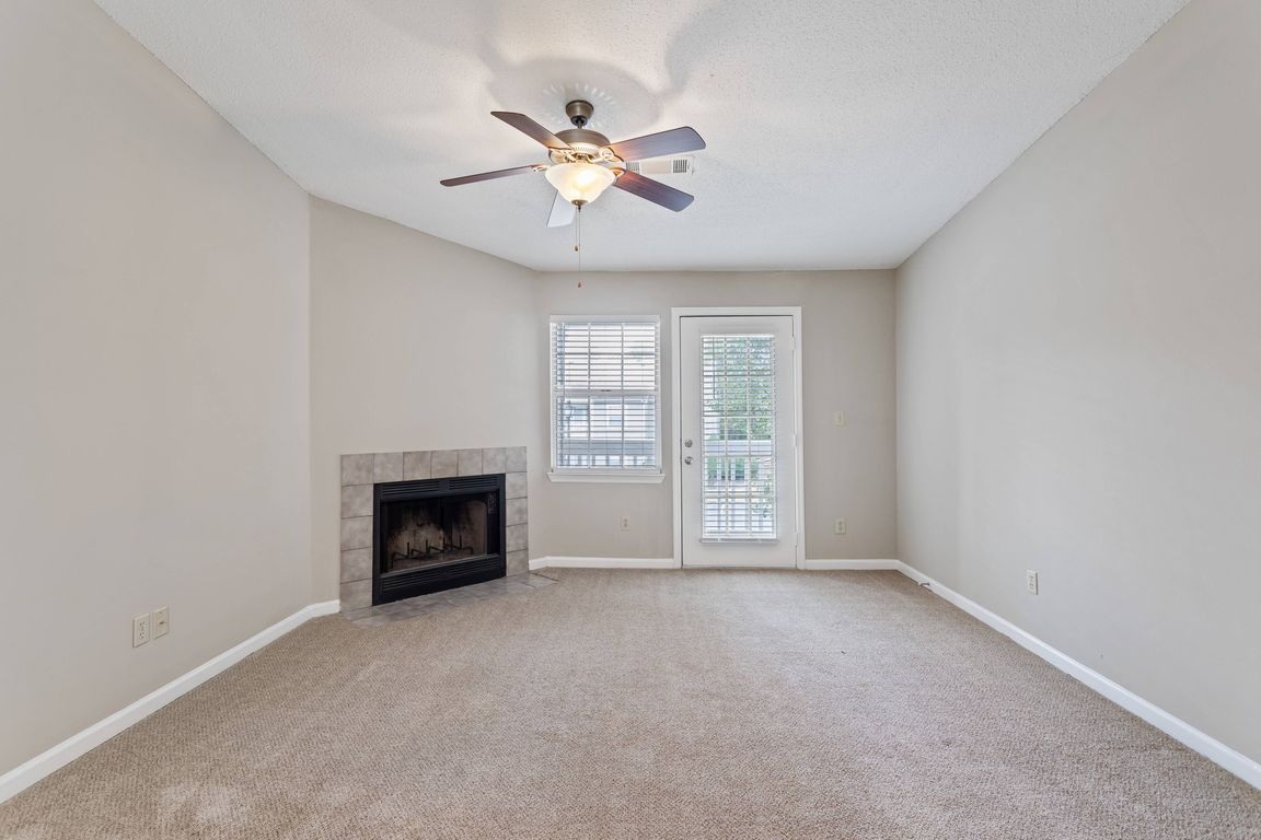 Living Room with Private Patio Access