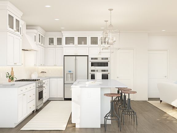 Glass upper white cabinets in kitchen