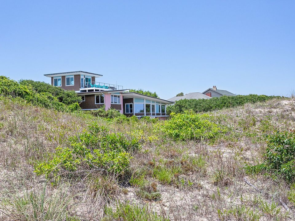 View of Frank Lloyd Wright inspired home from dunes