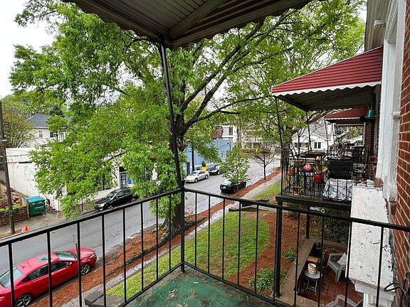 Top floor corner unit with private porch!