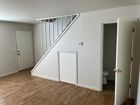 Living Room, 1/2 Bath, and Stairs