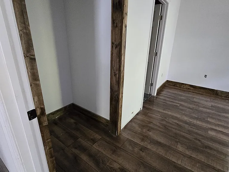 One of 2 master bedrooms