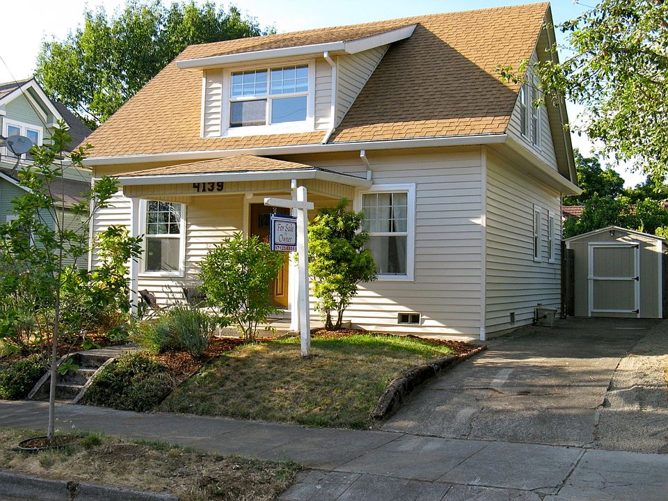 Front of House with Long Driveway and Shed