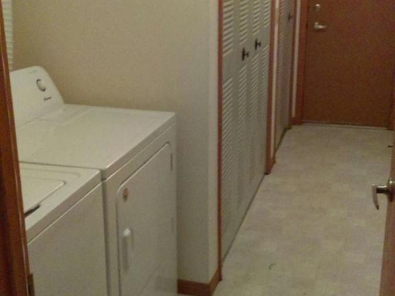 laundry with brand-new washer and dryer