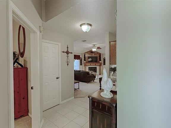 Walking in front door to the left.  Note master and easy access coat closet