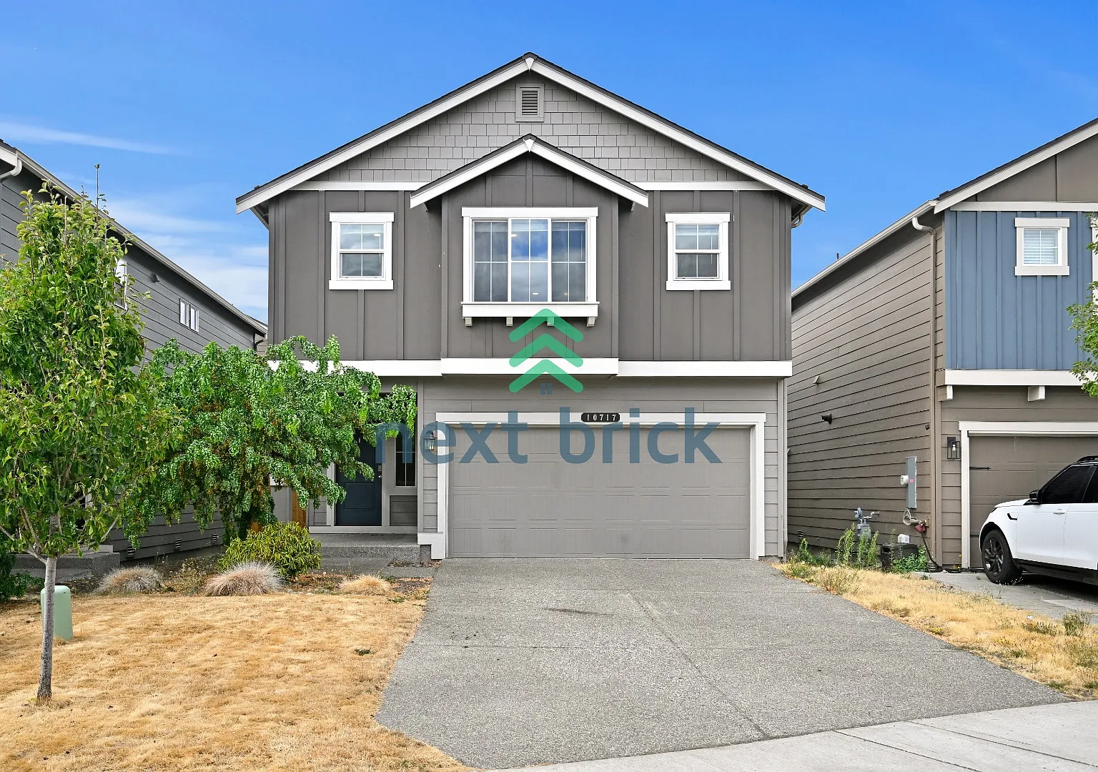 "Charming 4-Bedroom Home in Puyallup with Spacious 1831 Sq Ft Layout & 2.5 Baths!" — Photo 1