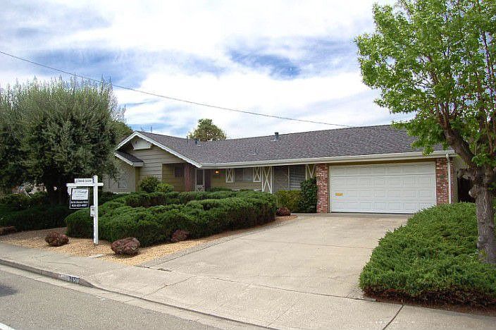 Front of house facing the 5th tee of the Royal Vista Golf Course