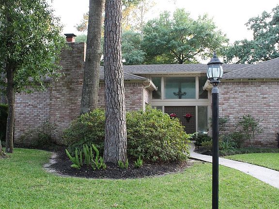 Lots of brick and trees. Wonderful curb appeal!