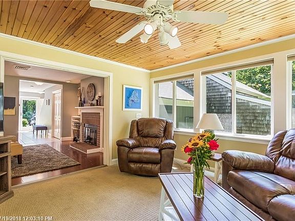 The 4 season room openly flows into the living/dining area.