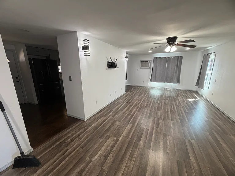 Entryway with kitchen on the left