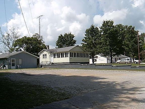 View of store and 2 homes