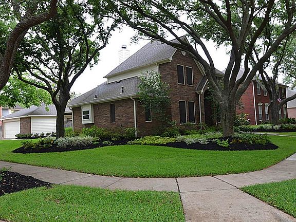 Corner lot with 2 1/2 car side load garage