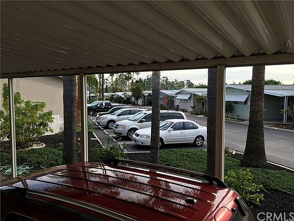 Carport overlooks the nearby guest parking area. No hiking shoes needed for visitors!