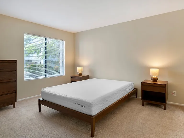Furnished+ apartment homes feature queen bed with mattress, dresser, nightstands, and lamps.(Representative Image exact items and style of furnishings may vary)