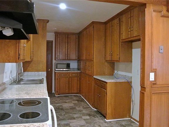 Clean tidy kitchen with newer flooring