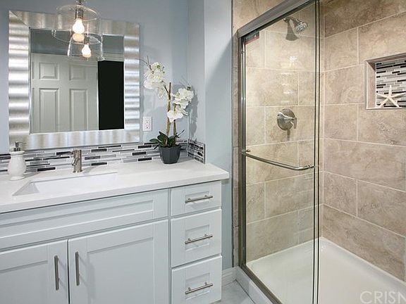 Remodeled guest bath with new state-of-the art whi