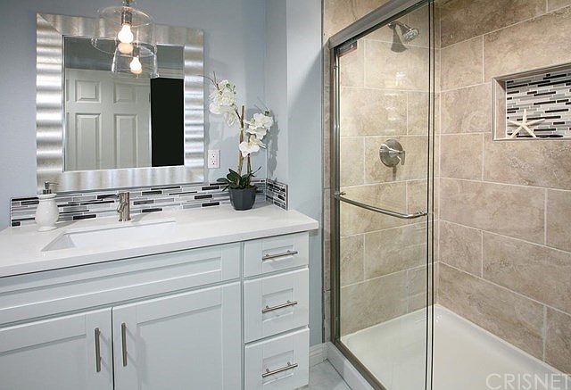 Remodeled guest bath with new state-of-the art whi