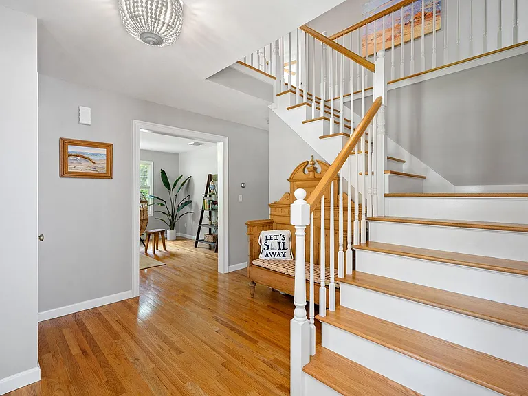 Entryway & stairs leading to second floor.